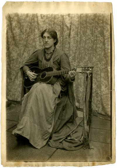 May Morris with a guitar, c.1886 by Unknown